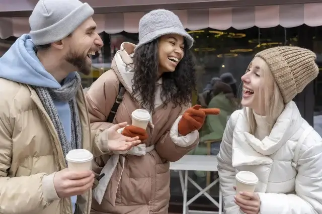 medium shot friends with coffee cups